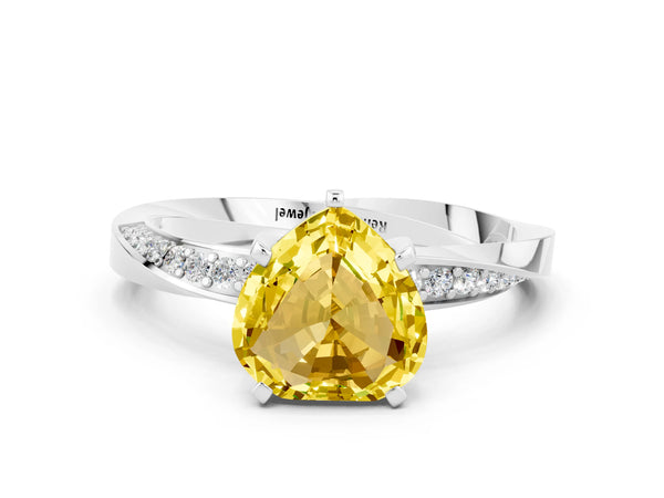 Platinum Heart Cut Yellow Sapphire Engagement Ring with Side Stone Accents and Four-Prong Setting