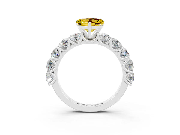 White gold Heart Cut Yellow Sapphire Prong Setting with Side Stones on a Pave Band