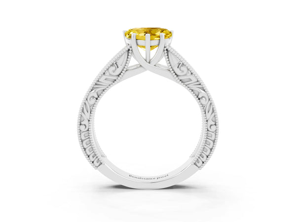 Platinum Heart Cut Yellow Sapphire Solitaire Ring with Engraved Band and Four-Prong Setting