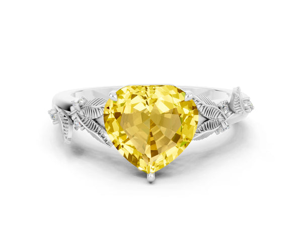 Platinum Heart Cut Yellow Sapphire Solitaire Ring with Leaf Motif Band and Four-Prong Setting