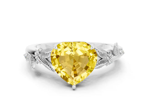 White gold Heart Cut Yellow Sapphire Solitaire Ring with Leaf Motif Band and Four-Prong Setting