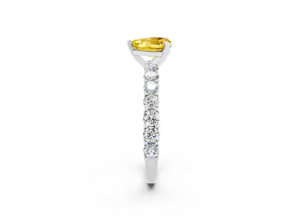 White gold Heart Cut Yellow Sapphire Solitaire Ring with Shared Prong Pavé Band and Four-Prong Setting