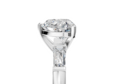 White gold Heart Solitaire with Tapered Baguette Side Stones on a Classic Band with Four-Prong Setting_140