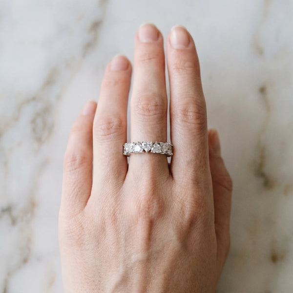 Platinum Heart cut diamond Eternity Band with Shared Prong Setting