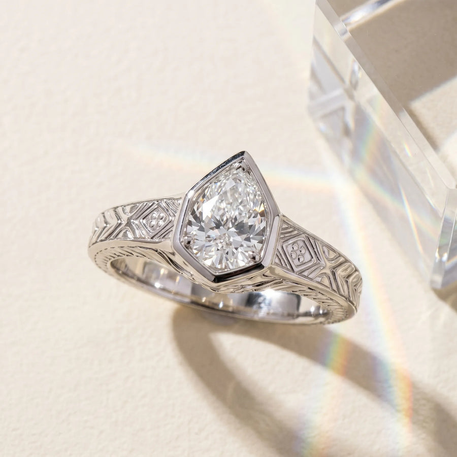 White gold Hexagonal Bezel Pear Diamond Engraved Band Ring
