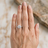 14K White Gold Hexagonal Halo 4.92 Carat E VVS2 Round Diamond Pavé Band with Four-Prong Setting