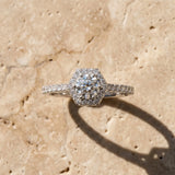 14K White Gold Hexagonal Halo 4.92 Carat E VVS2 Round Diamond Pavé Band with Four-Prong Setting