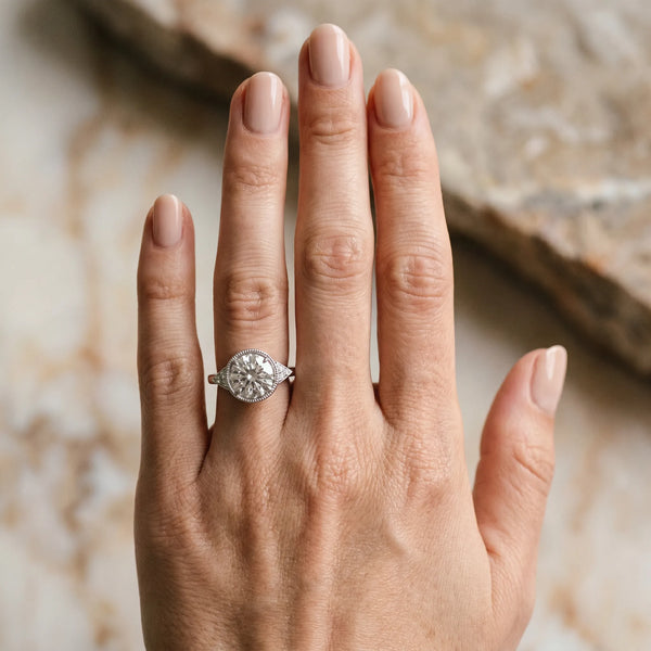 Platinum Hexagonal Halo Round Diamond Solitaire with Pavé Band and Four-Prong Setting