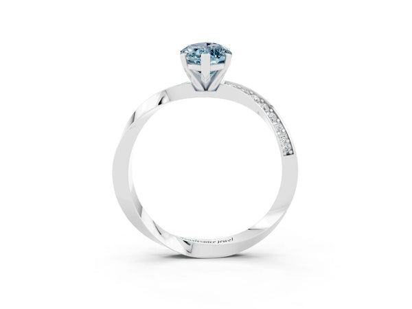 White gold Marquise Cut Aquamarine Engagement Ring with Side Stone Accents and Four-Prong Setting