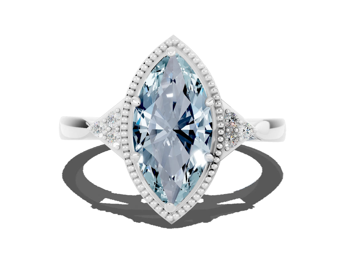 White gold Marquise Cut Aquamarine Halo Ring with Tapered Band and Four-Prong Setting