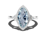 White gold Marquise Cut Aquamarine Halo Ring with Tapered Band and Four-Prong Setting