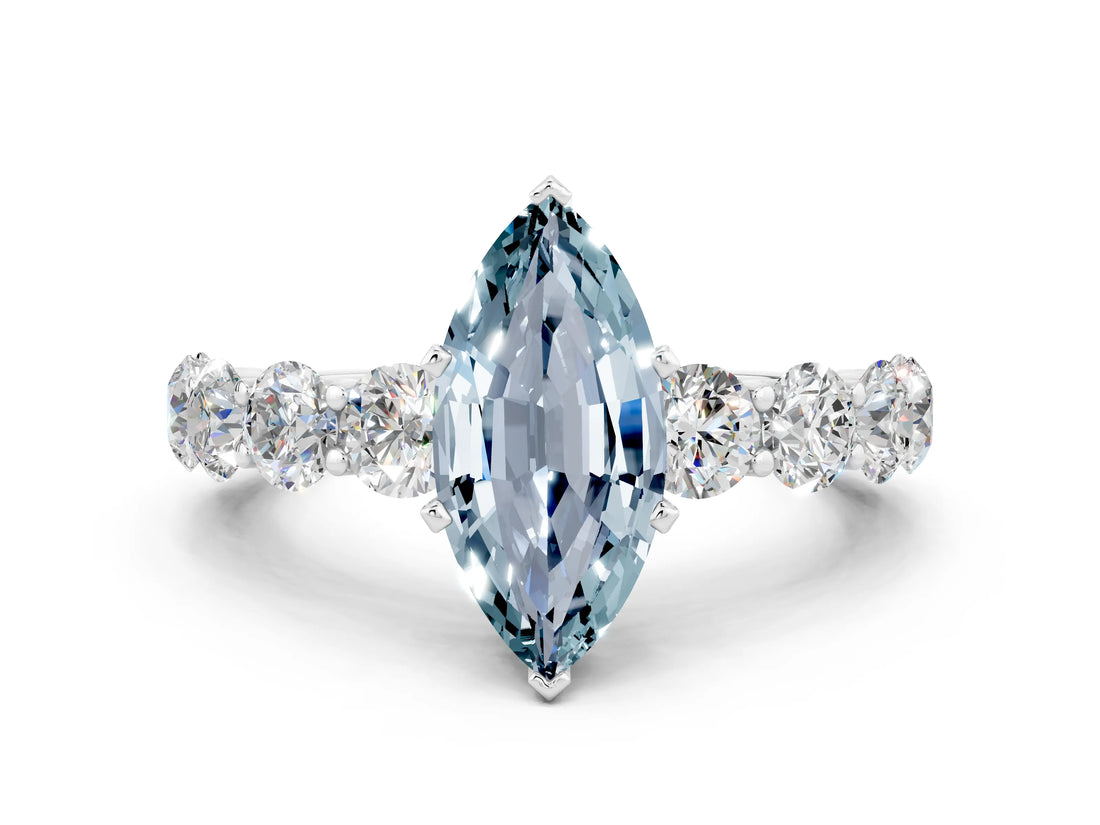 White gold Marquise Cut Aquamarine Prong Setting with Side Stones on a Pave Band