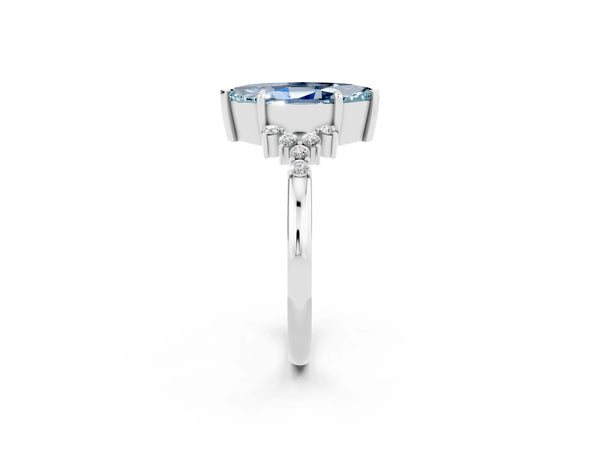 White gold Marquise Cut Aquamarine Ring with Side Stones and Four-Prong Setting