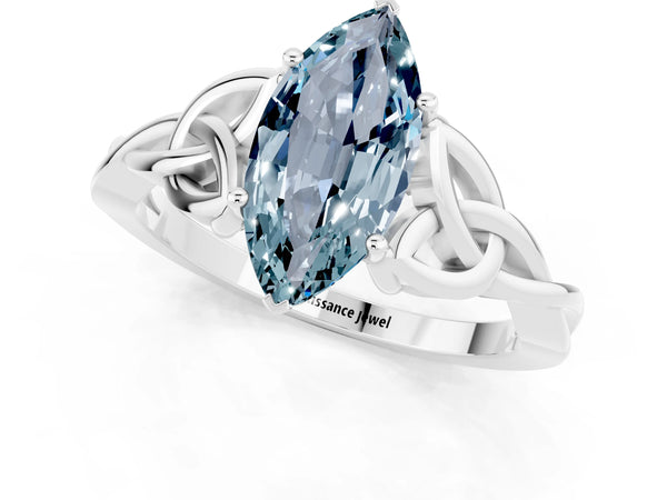 Silver Marquise Cut Aquamarine Solitaire Engagement Ring with Celtic Knot Band and Four-Prong Setting