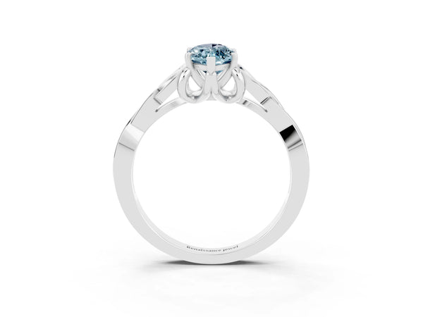 Silver Marquise Cut Aquamarine Solitaire Engagement Ring with Celtic Knot Band and Four-Prong Setting
