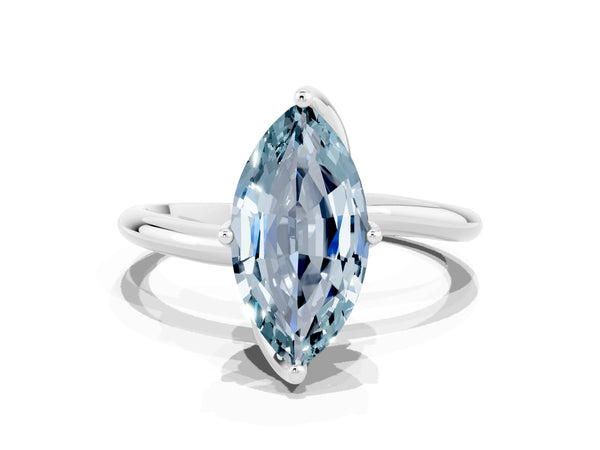 Silver Marquise Cut Aquamarine Solitaire Engagement Ring with Four-Prong Setting and Classic Band