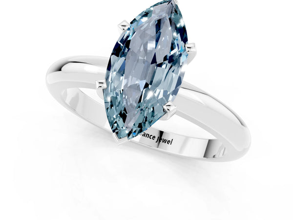 Silver Marquise Cut Aquamarine Solitaire Engagement Ring with Round Band and Four-Prong Setting