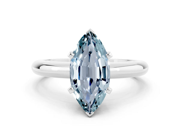 Silver Marquise Cut Aquamarine Solitaire Engagement Ring with Round Band and Four-Prong Setting