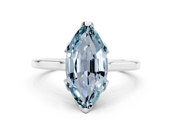 Silver Marquise Cut Aquamarine Solitaire Ring with Flower Prong Setting and Classic Band