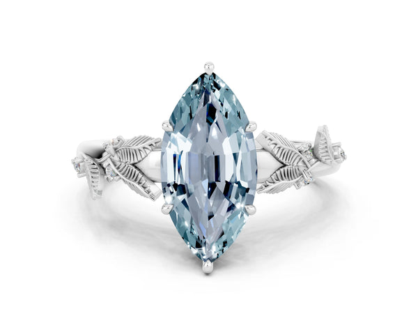 Platinum Marquise Cut Aquamarine Solitaire Ring with Leaf Motif Band and Four-Prong Setting