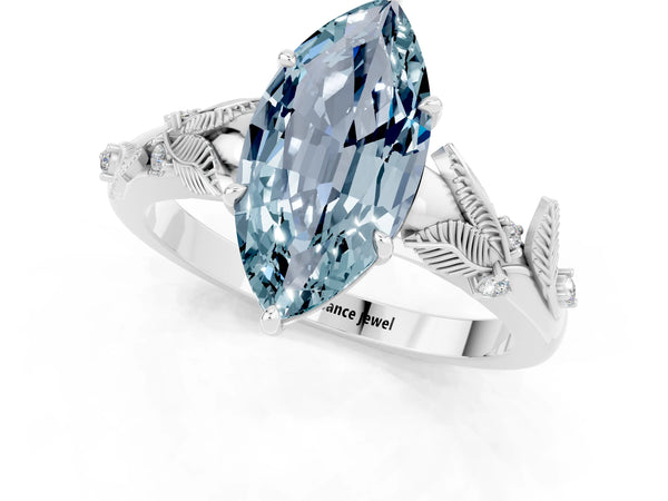 Platinum Marquise Cut Aquamarine Solitaire Ring with Leaf Motif Band and Four-Prong Setting