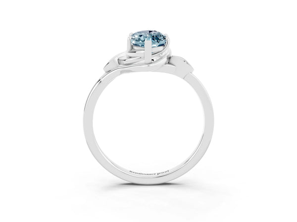 White gold Marquise Cut Aquamarine Solitaire Ring with Twist Band and Four-Prong Setting