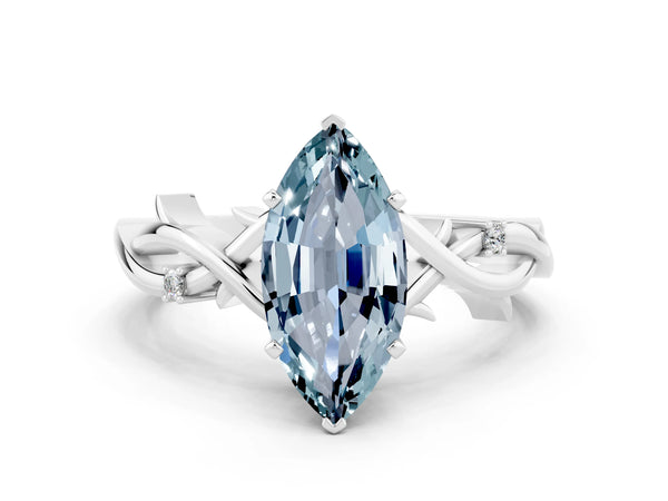 Platinum Marquise Cut Aquamarine Solitaire Ring with Twisted Band and Prong Setting