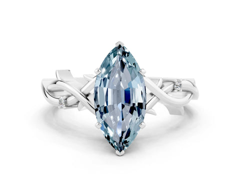 White gold Marquise Cut Aquamarine Solitaire Ring with Twisted Band and Prong Setting