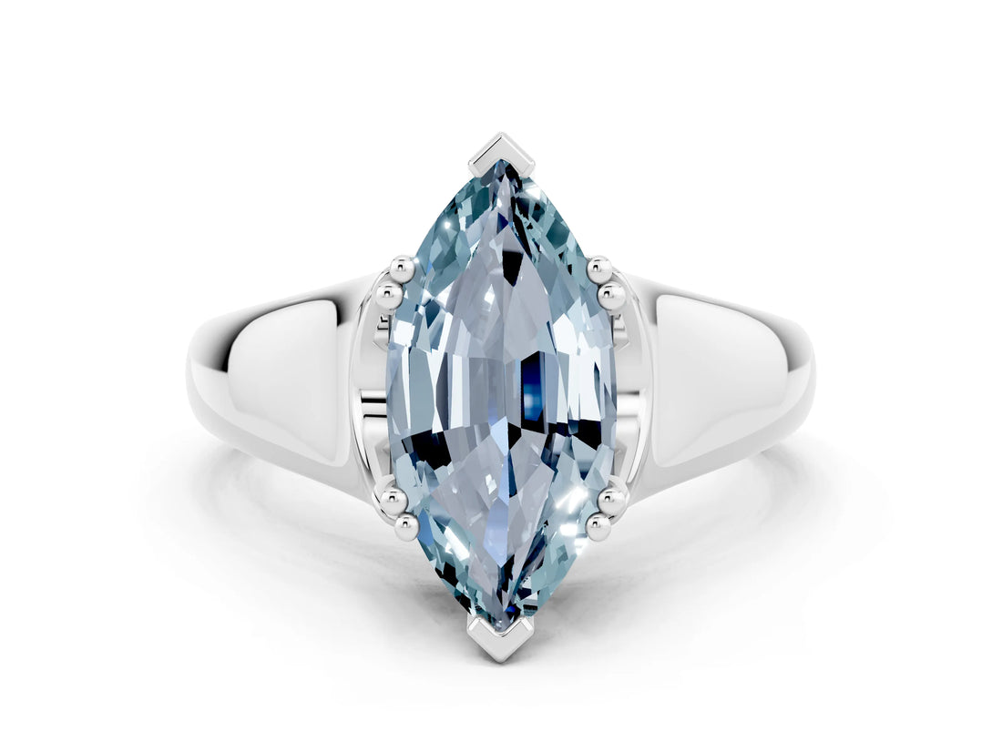 White gold Marquise Cut Aquamarine Solitaire Ring with Wide Band and Prong Setting