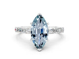 White gold Marquise Cut Aquamarine Solitaire with Side Baguettes and Channel Set Band