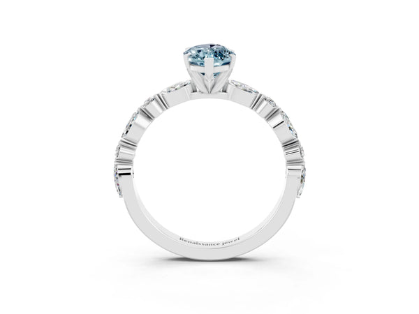 Platinum Marquise Cut Aquamarine Ring with Marquise and Round  Side Stones and Four-Prong Setting