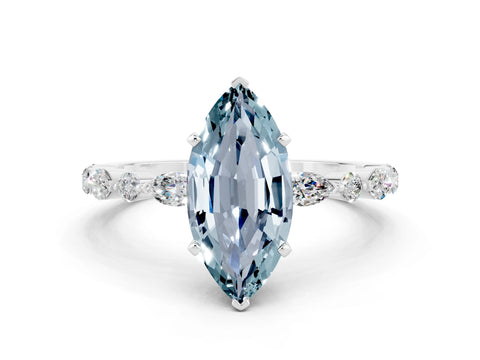 White gold Marquise Cut Aquamarine Solitaire with Side Stones on a Pavé Band and Four-Prong Setting
