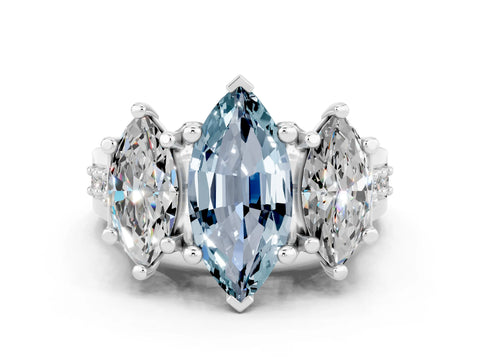 White gold Marquise Cut Aquamarine Three-Stone Ring with Channel Set Band and Four-Prong Setting