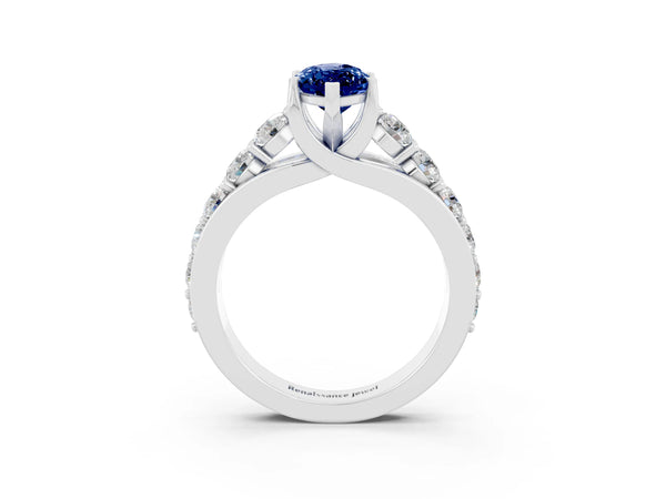 Silver Marquise Cut Blue Sapphire Engagement Ring with Pavé Band and Four-Prong Setting