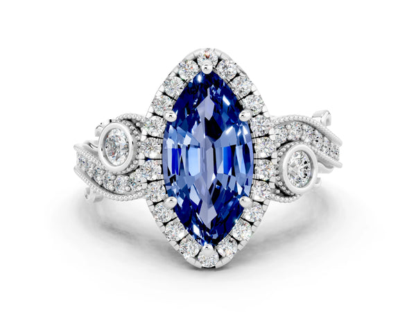 Silver Marquise Cut Blue Sapphire Halo Ring with Milgrain Pavé Band and Four-Prong Setting