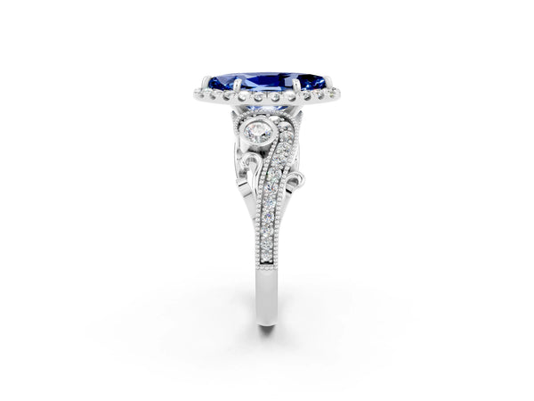 White gold Marquise Cut Blue Sapphire Halo Ring with Milgrain Pavé Band and Four-Prong Setting