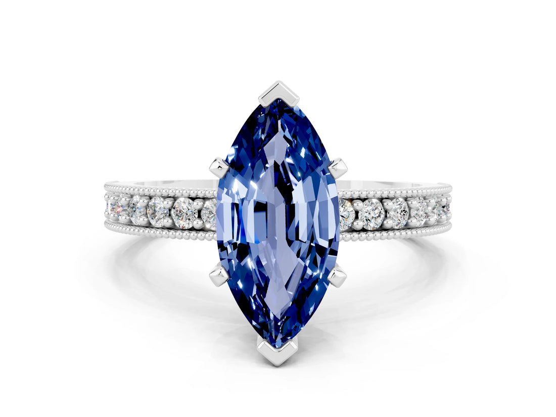 White gold Marquise Cut Blue Sapphire Milgrain Pavé Engagement Ring with Four-Prong Setting