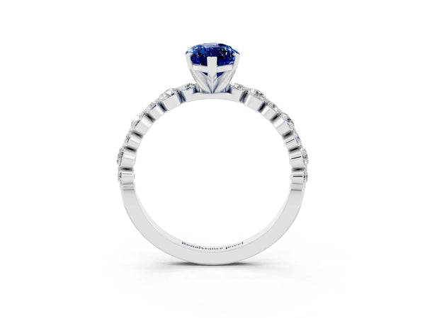 Platinum Marquise Cut Blue Sapphire Prong Set Engagement Ring with Pavé Band