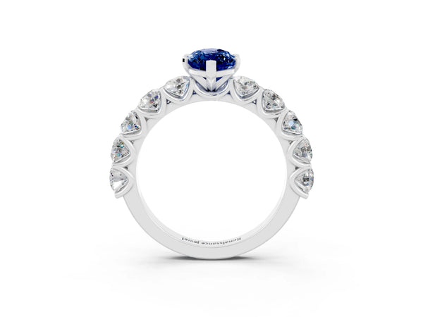 Platinum Marquise Cut Blue Sapphire Prong Setting with Side Stones on a Pave Band