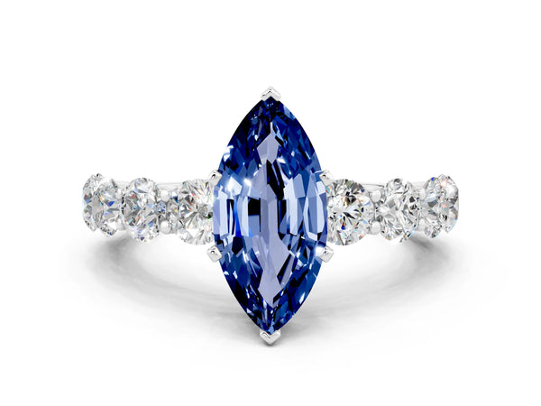 Silver Marquise Cut Blue Sapphire Prong Setting with Side Stones on a Pave Band