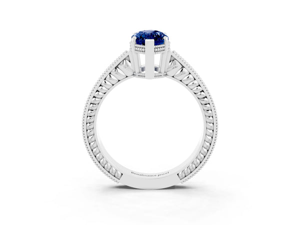 Silver Marquise Cut Blue Sapphire Ring with Milgrain Pavé Band and Four-Prong Setting