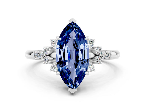 Platinum Marquise Cut Blue Sapphire Ring with Side Stones and Four-Prong Setting