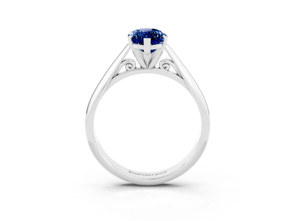 White gold Marquise Cut Blue Sapphire Solitaire Engagement Ring with Cathedral Setting and Four-Prong Mount