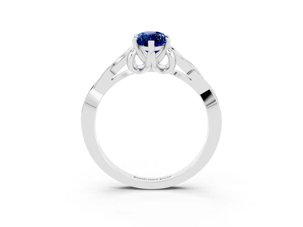 Platinum Marquise Cut Blue Sapphire Solitaire Engagement Ring with Celtic Knot Band and Four-Prong Setting