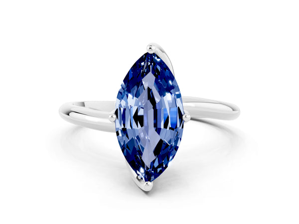 Silver Marquise Cut Blue Sapphire Solitaire Engagement Ring with Four-Prong Setting and Classic Band