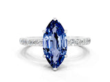 White gold Marquise Cut Blue Sapphire Solitaire Engagement Ring with Pavé Band and Four-Prong Setting
