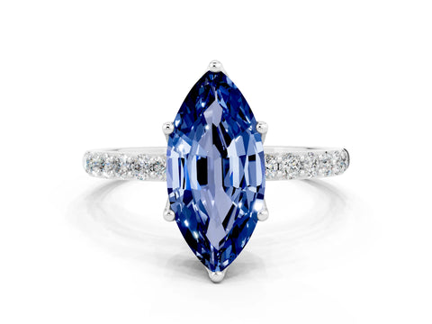 White gold Marquise Cut Blue Sapphire Solitaire Engagement Ring with Pavé Band and Prong Setting