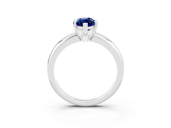 Platinum Marquise Cut Blue Sapphire Solitaire Engagement Ring with Round Band and Four-Prong Setting