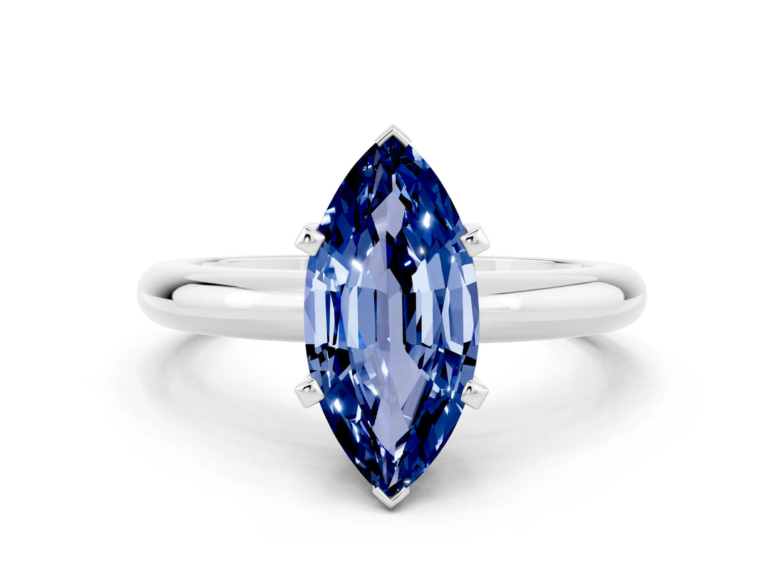 White gold Marquise Cut Blue Sapphire Solitaire Engagement Ring with Round Band and Four-Prong Setting