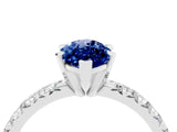 White gold Marquise Cut Blue Sapphire Solitaire Pavé Engagement Ring with Round Band and Prong Setting_16